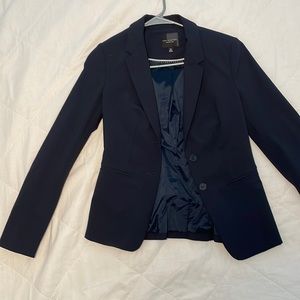 Navy Blue The Limited Womens suit.  See sizes in pictures.  Only worn once.